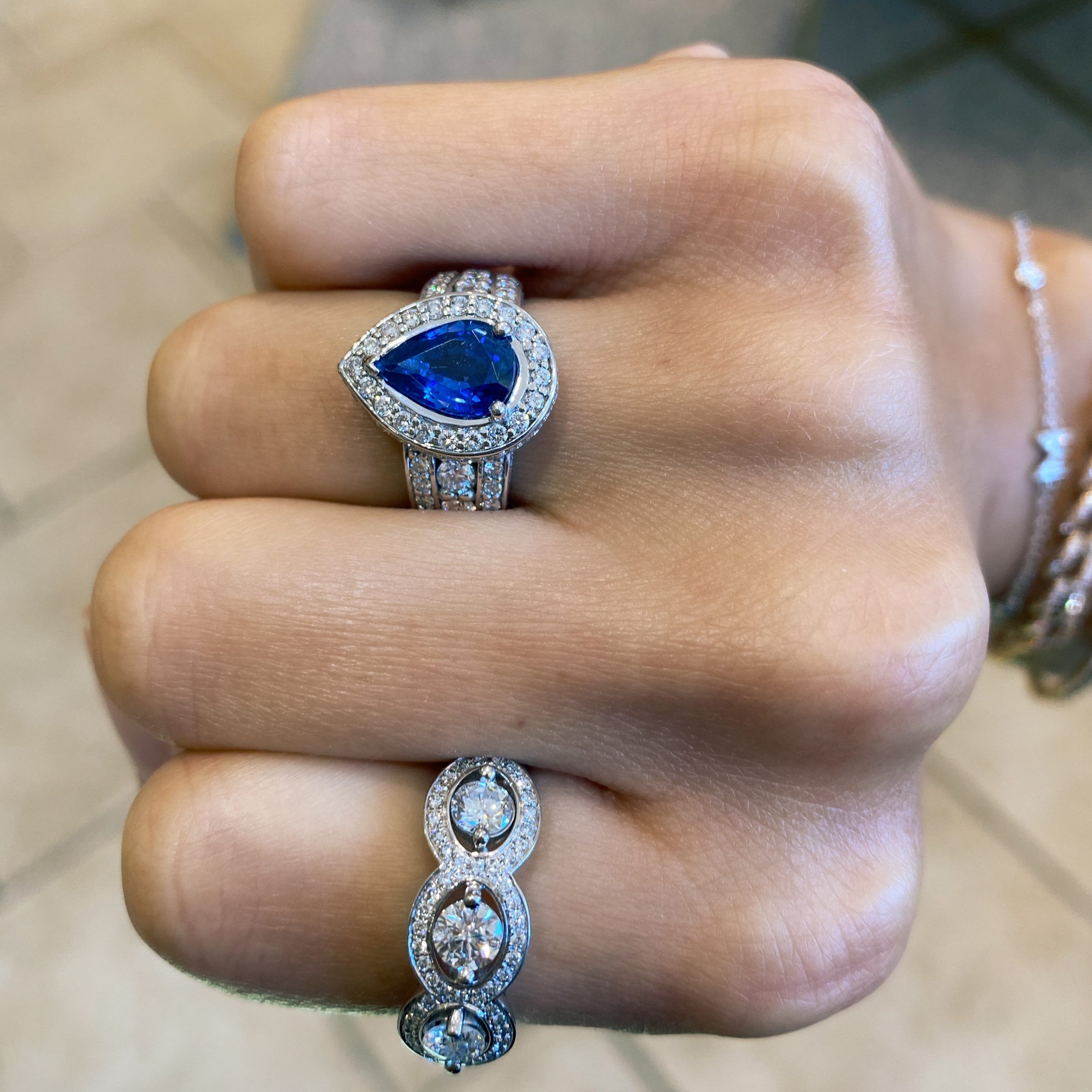 Three stone ring and pear tanzanite ring stack