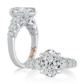 Classic Four Prong Oval Cut Diamond Flanked Engagement Ring
